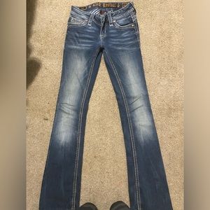 Dark blue jeans, they are not my style and I have jeans that look like them